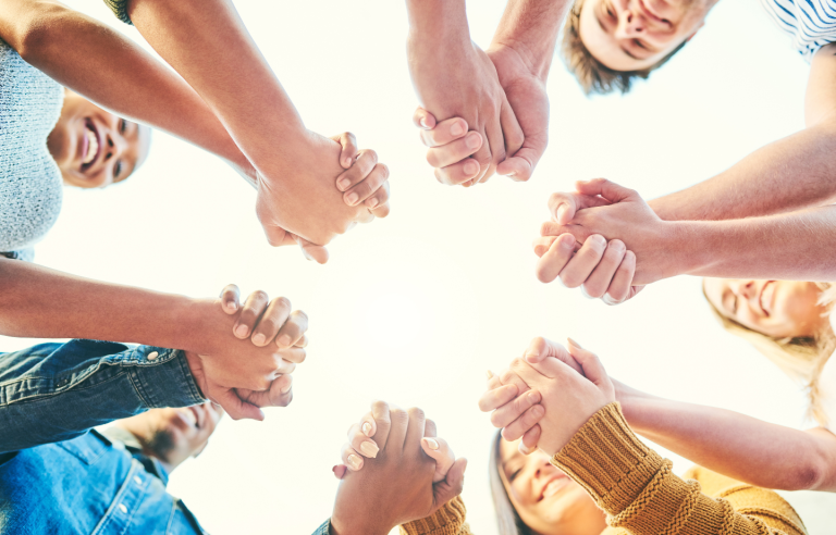 Group coaching session with engaged participants collaborating